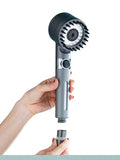 Someone holding a High-Pressure 3-Mode Shower Head